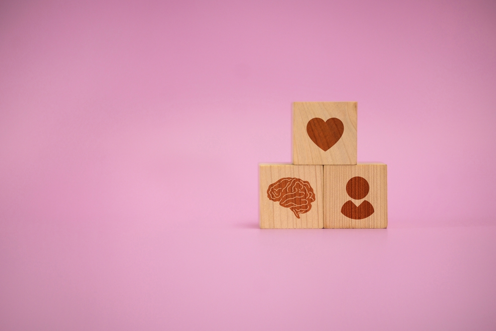 Wooden,Blocks,With,Brain,,Heart,,And,Person,Icons,Symbolizing,Mental holistic psychiatry
